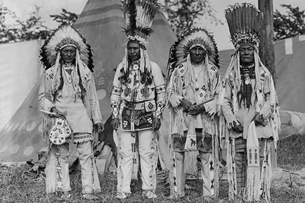 Four Native American Chiefs in Traditional Clothing and Feathered Bonnet