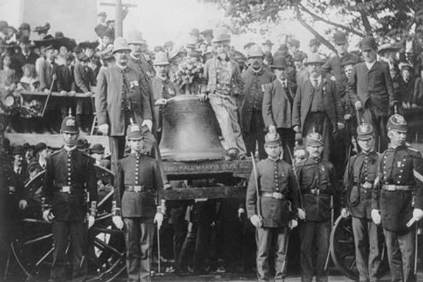 Boston Police watch over the Liberty Bell that has arrived by Train