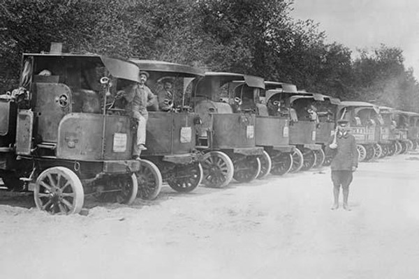 A Fleet of Trucks each with its own Driver is arrayed and ready to transport troops.