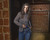 Casual female wearing Lady Defender holster at waist with cushioned comfort for discreet concealed carry
