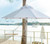 Homecrest 7.5' Octagonal Market Outdoor Umbrella is an elegant shade option for any outdoor dining area
