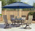 Homecrest 9' Octagonal Market Outdoor Umbrella adds a pop of style and color to your patio (*Seating sold separately)