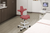 HAG Capisco 8106 Stool is used in hospitals and labs for the  technician's ergonomic comfort