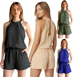 This Women's Summer Romper is a stylish and comfortable choice for casual occasions during the warmer seasons. The collared tank top and sleeveless design make it perfect for staying cool and chic on sunny days. The pullover closure and button closure in the back add a touch of modern flair, while the pockets add both functional and fashionable elements to the romper. Made from easy-to-care-for polyester material, this one-piece outfit is machine washable for convenience. Perfect for a fashion-forward woman looking for a trendy and versatile piece for her wardrobe. A romper is a one-piece garment that combines a top with shorts, creating a casual, "one-and-done" outfit. Rompers provide the look of a dress or blouse-and-shorts set with the ease of a single garment.