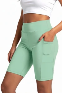 Green gym shorts. Those shorts are designed for ladies that are super active and fashionable. Stretch and cool comfort workout biker shorts. Great Bermuda shorts for riding your bike, running or attending yoga class.  Ideal length - 8.5" provides control of coverage yet allows you to freely move and exercise. Perfect for your vacation gateway. You will love how great those feel on your skin. Pockets on both sides