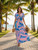 Lightweight Summer Dress. Beautiful Hawaiian themed dress that is perfect for your summer evening event . Butterfly flowy sleeves are supper flattering. Deep v neck line with smocked under bust