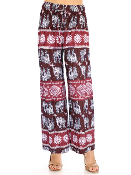 Burgundy Elephant summer pants. These high-waisted women's pleated slinky stretchy palazzo pants are great for casual wear .The trendy loose fit and super elegant and chic colors are unique and will take your summer look to another level. The lightweight and flowing fabric is ideal for hot summer days. The wide legs combined with pleating from the waist down make these pants move like a skirt and create a flattering volume. The modern elephant design in fashionable colors can be easily dressed up or down.