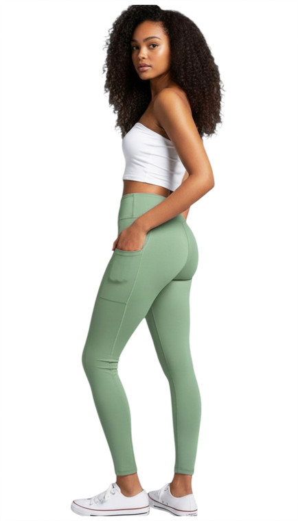 Green  buttery soft yoga leggings.  The High Waisted Pocket Leggings sculpt and smooth fabric. Featuring dual side pockets and targeted compression these leggings deliver performance comfort from studio to street.