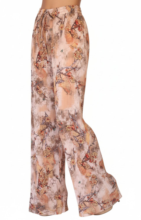 Elevate your wardrobe with those Women's Printed Pleated Palazzo Pants. Designed to combine comfort and style, these pants feature a high-rise elastic waist with a pull on closure, ensuring a snug and flattering fit. The wide-leg silhouette offers a relaxed and fluid look, perfect for various occasions from business to formal events, or even for casual outings. Crafted from a lightweight blend of 85% polyester  and 15% spandex, these pants are not only breathable but also stretchable, providing the flexibility you need throughout the day. Pleated accents add a touch of elegance, while the machine washable fabric ensures easy care. With their full-length design and versatile nature, they are a must-have for the summer, fall, and spring seasons. Trendy loose fit and super elegant and chic colors are unique and will bring your summer look to another level . Lightweight and flowing fabric is ideal for those hot summer days. Wide legs combined with pleating from the waist down makes it move like a skirt creating a flattering volume. Fashionable prints and colors !