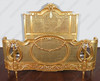 Antiqued Gold Leaf & Rattan Regency Bed