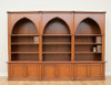 11ft Mahogany Gothic Style Triple Bay Bookcase with Arched Open Shelves and Storage Base