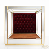 Glamorous gold and velvet mirrored canopy bed