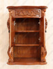 Custom mahogany over-the-toilet bathroom cabinet
