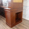 Elegant mahogany corner bar with liquor display