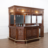 Elegant mahogany corner bar with liquor display