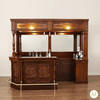 Elegant mahogany corner bar with liquor display