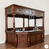 Elegant mahogany corner bar with liquor display
