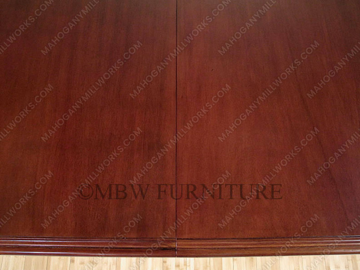 24ft mahogany conference table with carved pedestals