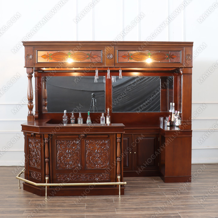 Elegant mahogany corner bar with liquor display