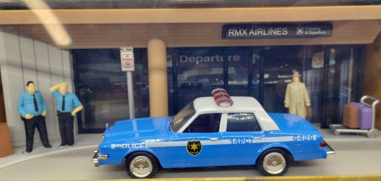 The Usual Suspects 1984 Dodge Diplomat New York Police Car Airport Diorama 1:43 Scale Die Cast Model