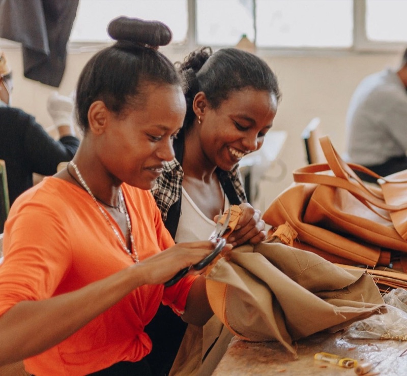 Artisans collaborating in a Parker Clay workshop