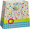 Floral patterned gift bag with green ribbon and pink lower section.
