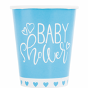 Close-up of blue heart design on paper cups