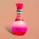 A lively bottle of I Can Dance Pour Femme Eau De Parfum, featuring a playful design with sparkling accents, capturing the vibrant and joyful spirit of dance.