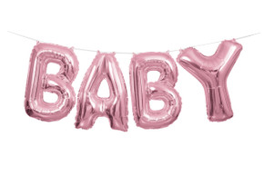 Pink foil balloon banner spelling "BABY"