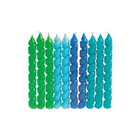 Green and blue birthday candles arranged for cake decoration