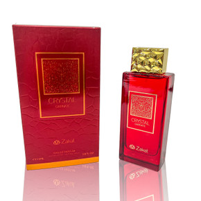 A sleek and modern 3.4 fl oz BARQ Eau de Parfum bottle designed with minimalist elegance. The bottle features a clear base that showcases the soft golden hue of the fragrance, complemented by a metallic cap that adds a luxurious touch.