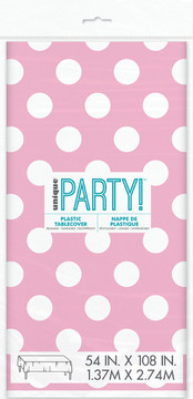 Pink plastic table cover with white polka dots 54 in x 108 in