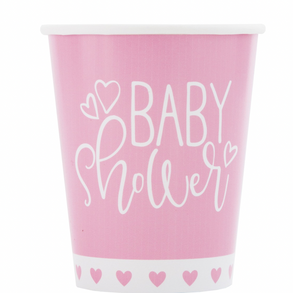 Close-up of pink hearts design on paper cups