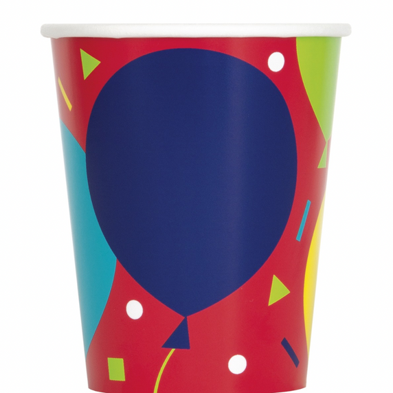 Close-up of colorful balloon birthday design on paper cups