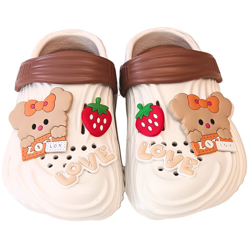 Toddler lightweight beach slippers in clean ivory white with earth-brown accents and cute blushing teddy bear charms.