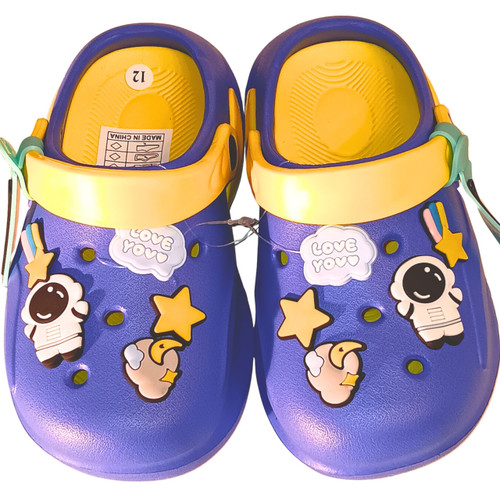Bold royal blue clogs with a secure heel strap and playful space-themed 3D decorative charms.