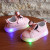 Baby's flashing lights polka dot shoes