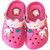 Soft pink sandals featuring a winking bunny and sweet strawberry charms.