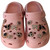 Light Pink Butterfly & Heart Charm Clog – A soft, blush pink clog featuring elegant gold chains and sparkling butterfly accents.