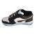 Essential streetwear athletic shoe featuring contrasting black flat laces, deep black paneling, and an embossed black athlete silhouette on the tongue.