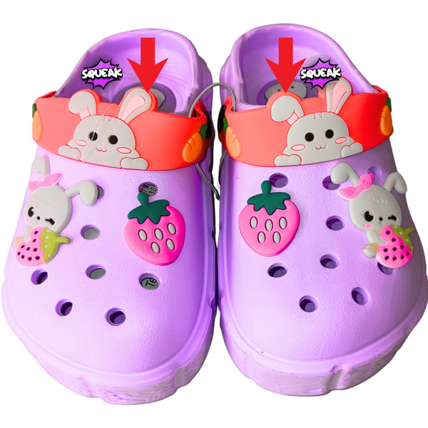 Pastel purple clogs with adorable bunny straps and fruit accents.