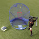 player hitting balls into a net outside