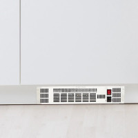TCP plinth heater TBYPLINHEATJKPH12NTL showing airflow vents and control module TCP plinth heater TBYPLINHEATJKPH12NTL showing airflow vents and control module