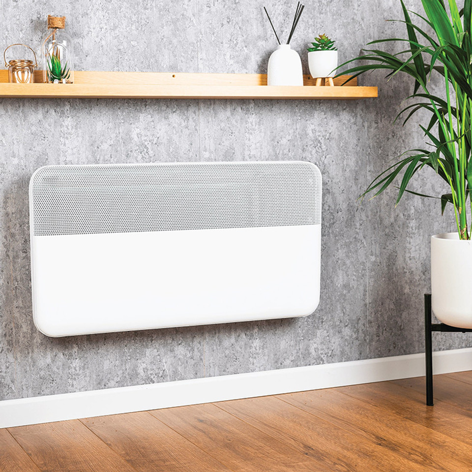 TCP 2000W white panel heater installed beneath window in modern living room