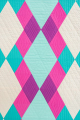Close up details of Harlequin Quilt, modern Equilateral Triangle quilt
