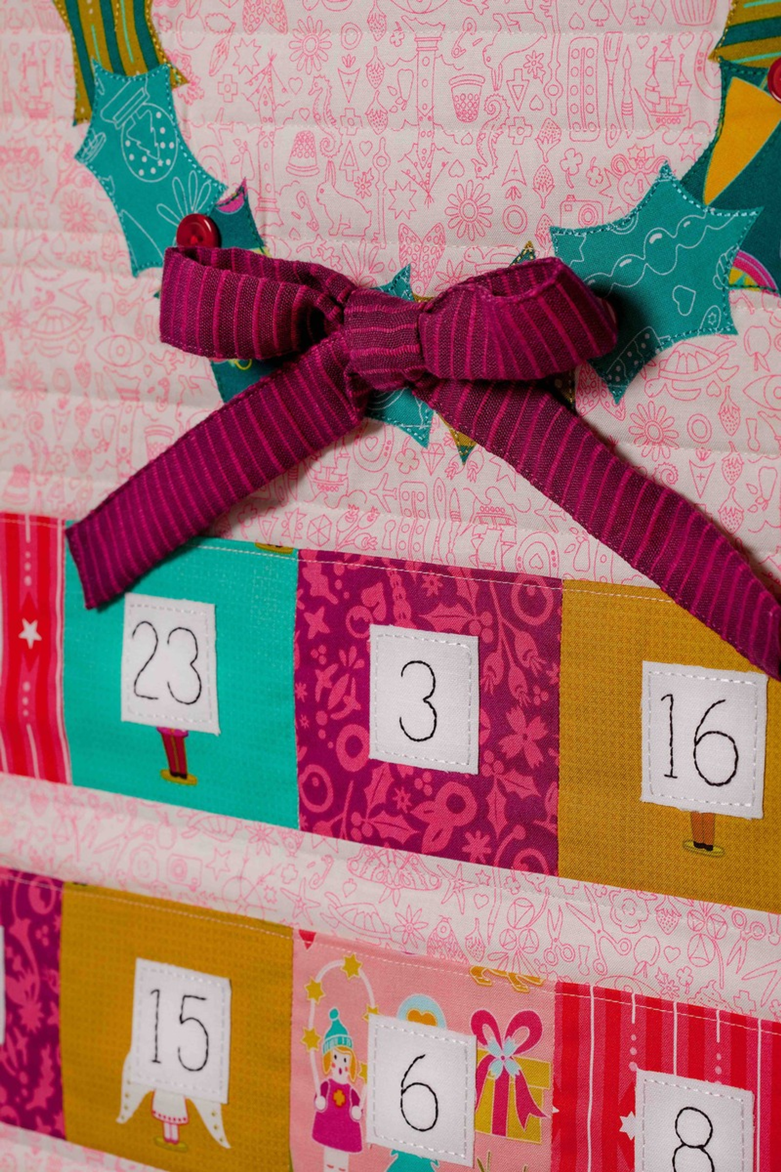 Christmas Cheer Advent Calendar PDF Pattern Tied with A Ribbon