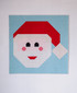 Santa lap quilt traditional Christmas colours made with Ruby Star Speckled fabric