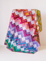 Log cabin block using prints and solids to create this two tone effect