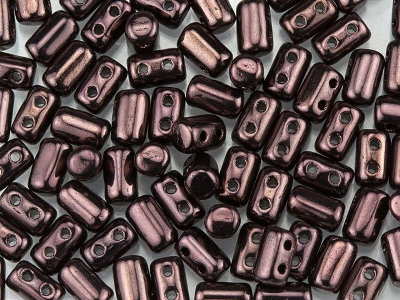 Matubo Duets 2 Hole 0384915695 sold in units of approx 10 gms. RULLA Beads 3mm x 5mm BlackWhiteBronze Luster