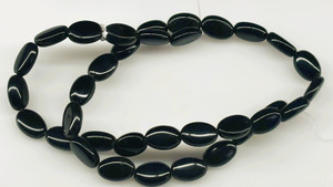Black Stone Beads, 8x12mm Puffed Oval (strand)